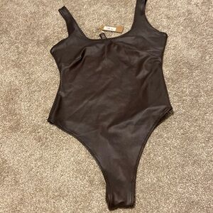 Skims body suit